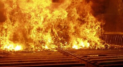 Municipal solid waste during combustion in a moving grate incinerator